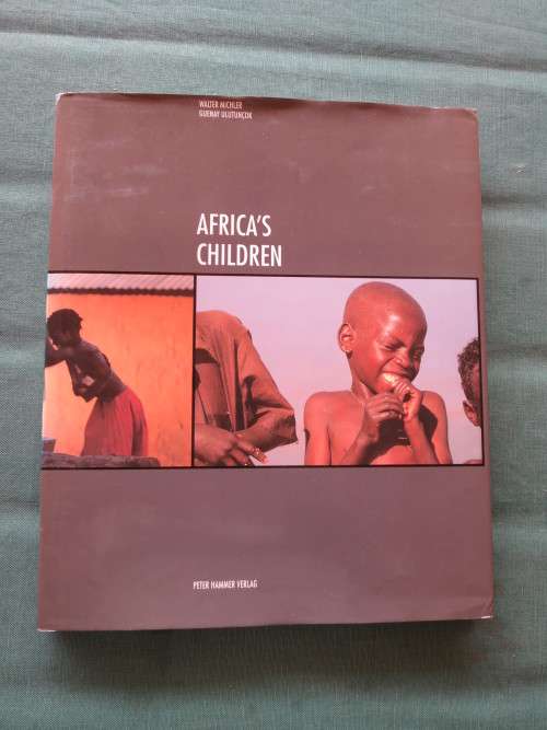 AFRICA`S CHILDREN  Text by Walter Michler and Photography by Guenay Ulutuncok