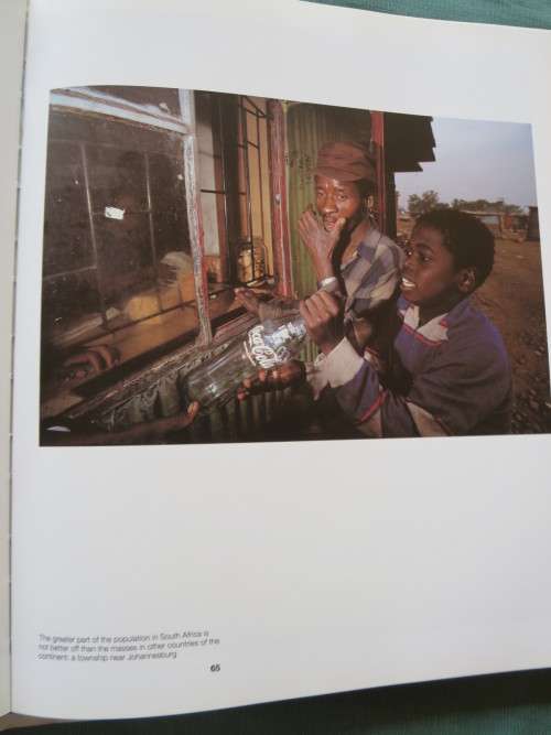AFRICA`S CHILDREN  Text by Walter Michler and Photography by Guenay Ulutuncok