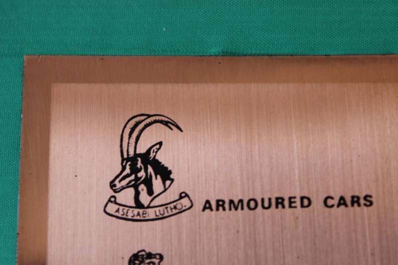 TWENTY RHODESIAN MILITARY BADGES MOUNTED IN SMART LEATHERLIKE BOX
