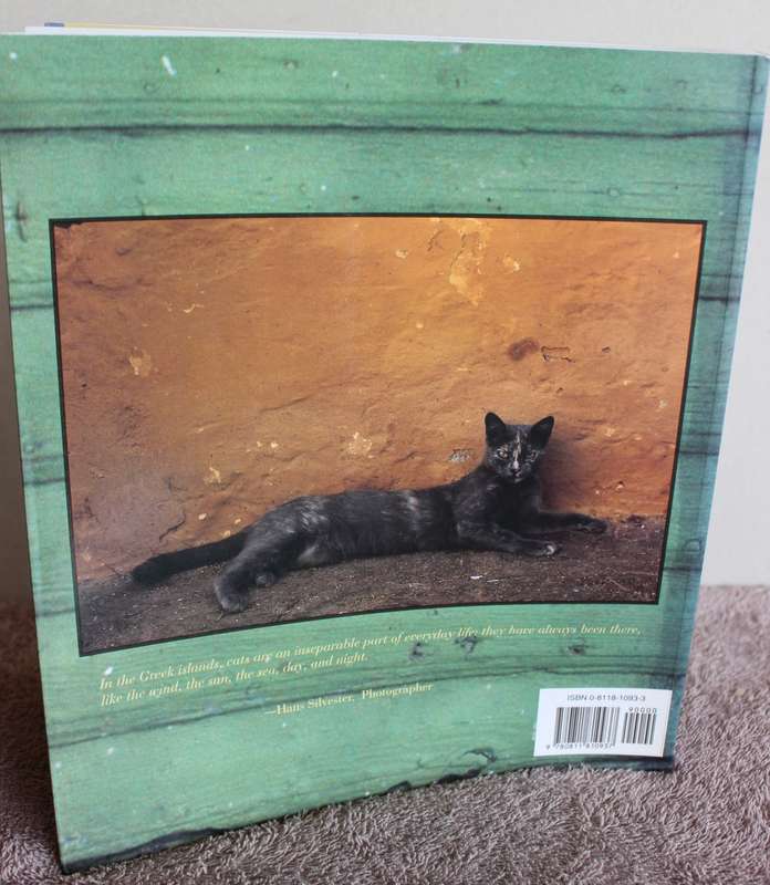 CATS IN THE SUN. Hans Silvester. (Combining cats with scenery of the Greek Islands)