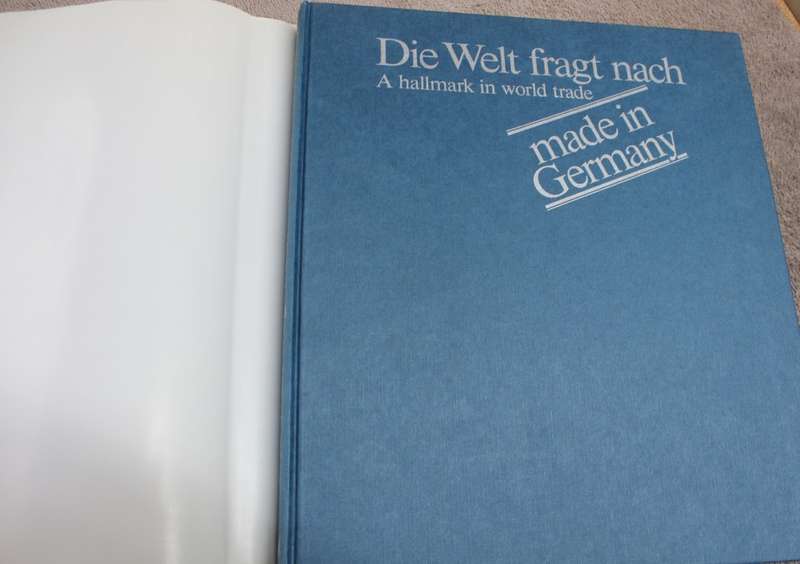 DIE WELT FRAGT NACH. A hallmark in world trade. Made in Germany. Alfred Lau.  (W)