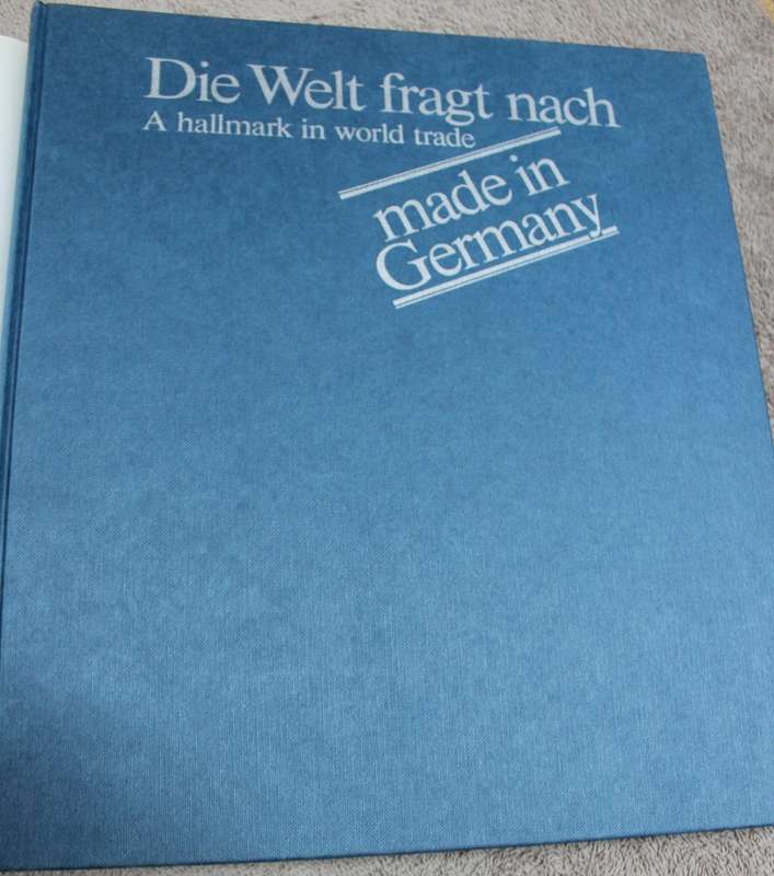 DIE WELT FRAGT NACH. A hallmark in world trade. Made in Germany. Alfred Lau.  (W)