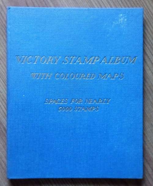 VICTORY STAMP ALBUM WITH COLOURED MAPS Spaces for nearly 5000 stamps.