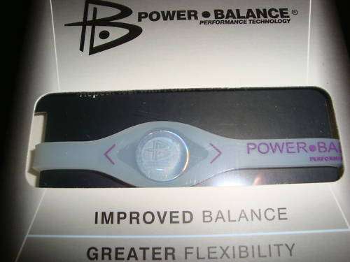 POWER BALANCE BRACELET MEDIUM*** CLEAR WITH PINK LETTER****