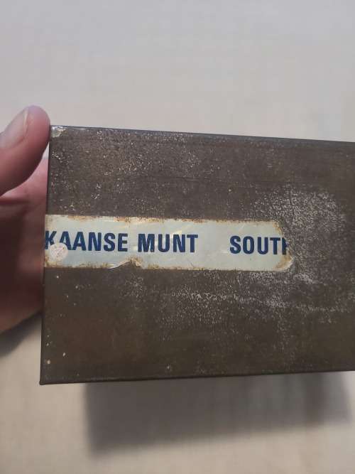 Silver .999 granules 27.595 OZ inside vintage SA Munt tin.