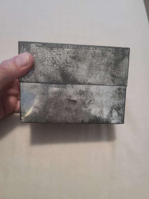 Silver .999 granules 27.595 OZ inside vintage SA Munt tin.
