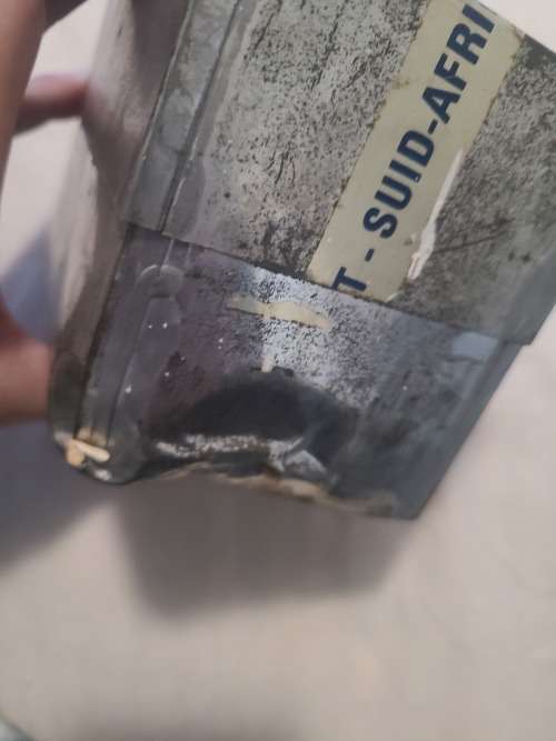 Silver .999 granules 27.595 OZ inside vintage SA Munt tin.