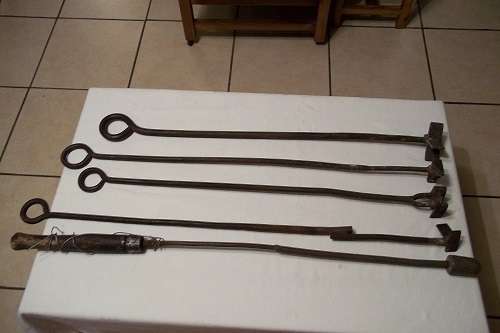 5 Vintage cast iron cattle branding irons - 1 copper head