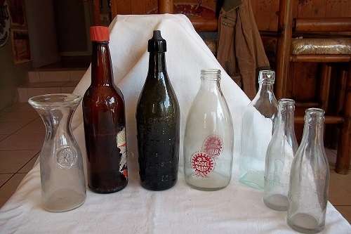 7 Vintage glass bottles for 1 bid
