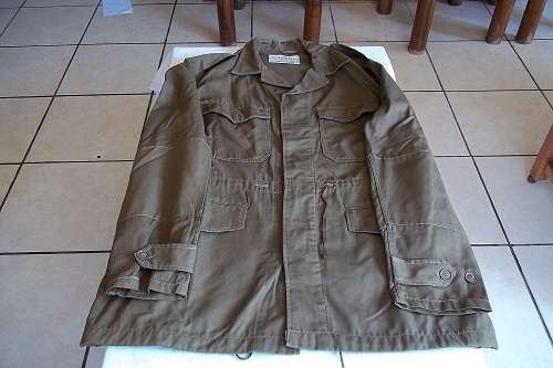 A vintage brown SADF nutria bush jacket