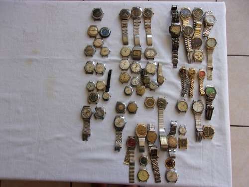 Large lot of 61 vintage name brand wristwatches for restoration