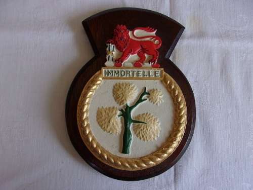 Vintage SAS Immortelle cast iron plaque