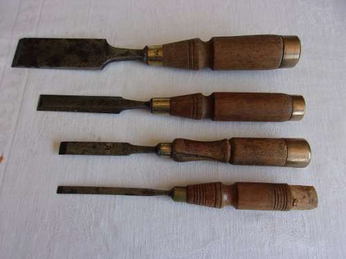 4 Vintage wooden handle chisels with brass trim - 1 bid for the lot