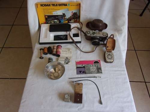 2 Vintage cameras and a lot of photography accessories for 1 bid