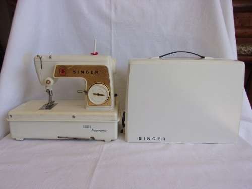 Vintage children's learning Singer Golden Panoramic 67B battery operated sewing machine