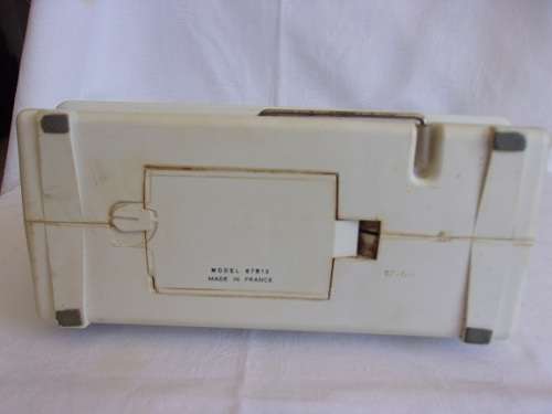 Vintage children's learning Singer Golden Panoramic 67B battery operated sewing machine