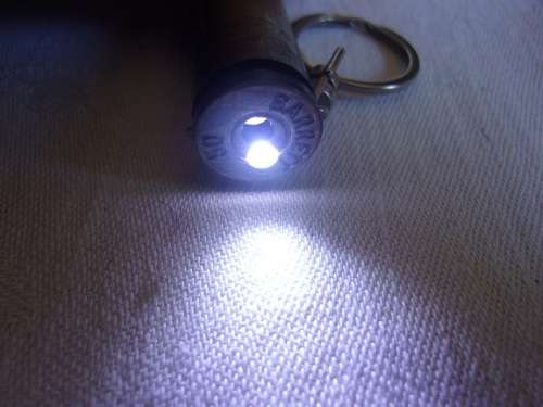 Real Barrett 50 bullet keyring and presentation pointer