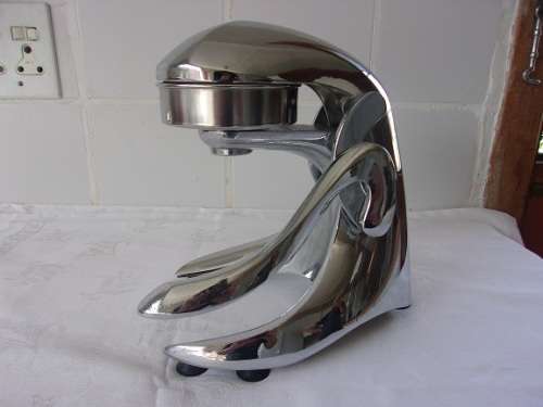 Retro chromed metal mechanical industrial lemon squeezer