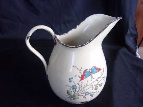 Vintage enamel milk & lidded sugar on matching tray