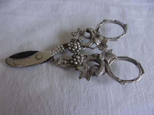 Vintage pair of Herbert Hooijkaas silverplate grape scissors