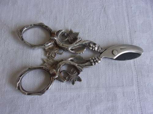 Vintage pair of Herbert Hooijkaas silverplate grape scissors