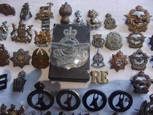Huge lot of 148 antique/ vintage military badges for 1 bid