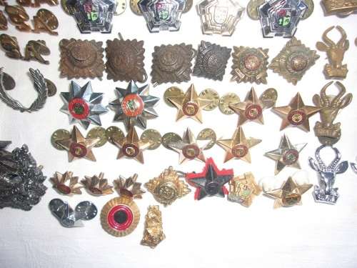 Huge lot of 148 antique/ vintage military badges for 1 bid