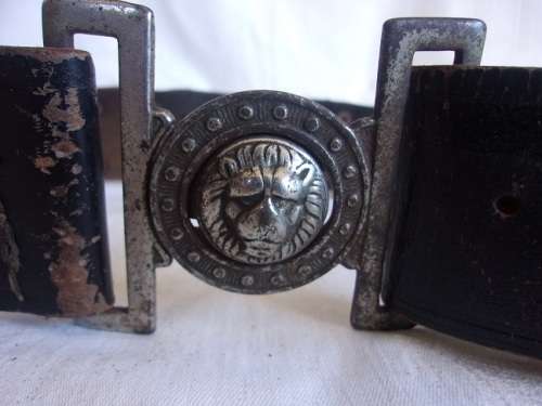 Vintage ammunition bandolier with lion head buckle