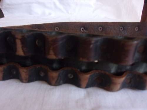 Vintage ammunition bandolier with lion head buckle