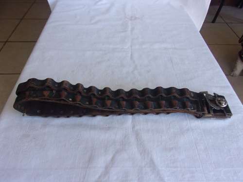 Vintage ammunition bandolier with lion head buckle