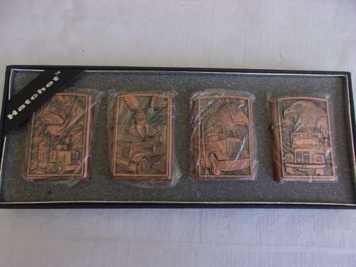 Boxed set of 4 Wenzhou Hatchet fuel cigarette lighters - eagle and truck theme