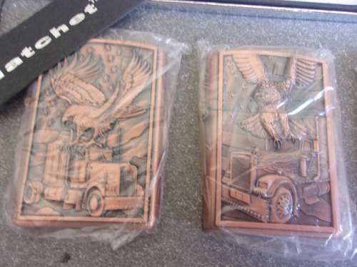 Boxed set of 4 Wenzhou Hatchet fuel cigarette lighters - eagle and truck theme