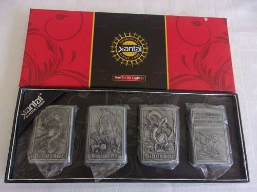 Boxed Smoking Set of 4 Jiantai fuel cigarette lighters - dinosaur theme