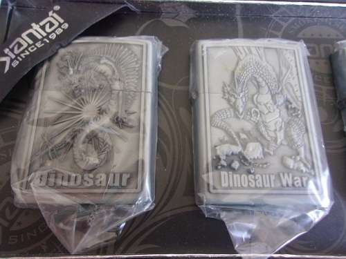 Boxed Smoking Set of 4 Jiantai fuel cigarette lighters - dinosaur theme