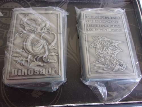 Boxed Smoking Set of 4 Jiantai fuel cigarette lighters - dinosaur theme