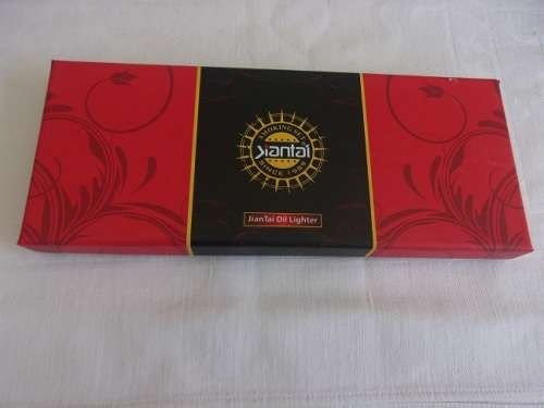 Boxed Smoking Set of 4 Jiantai fuel cigarette lighters - dinosaur theme