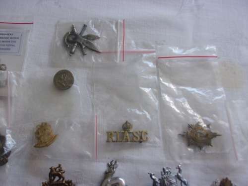 Large lot of over 100 vintage military badges, buttons and insignia for 1 bid