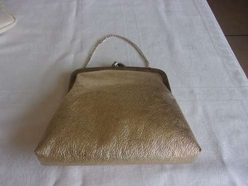 3 Vintage handbags and a purse for 1 bid