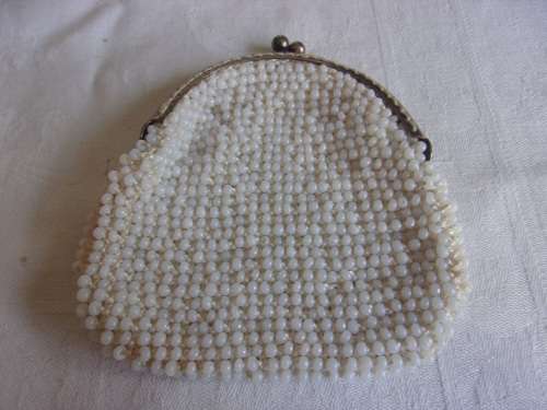 3 Vintage handbags and a purse for 1 bid