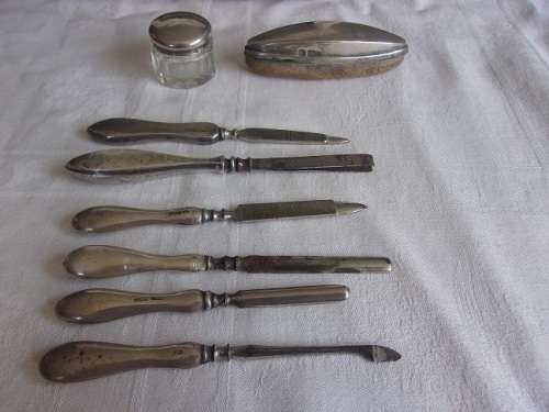 Vintage cased Sterling silver handle/lid manicure set and mirror