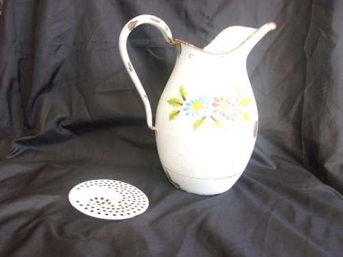Vintage enamel jug and plughole strainer for 1 bid