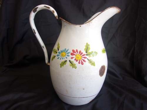 Vintage enamel jug and plughole strainer for 1 bid