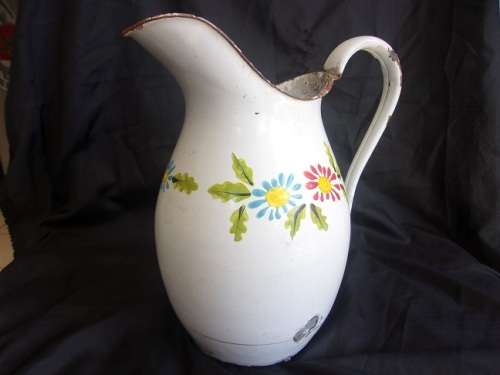 Vintage enamel jug and plughole strainer for 1 bid
