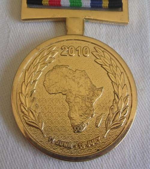 2010 gold plated SAPS Soccer World Cup Support medal with ribbon