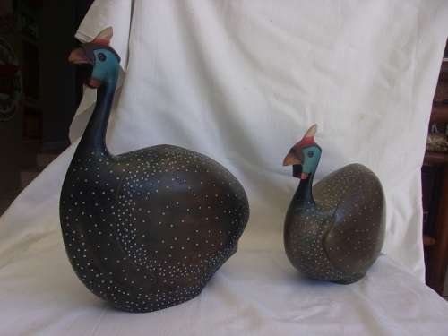 Pair of large limited edition `Feathers of Knysna` hand carved Guinea Fowl