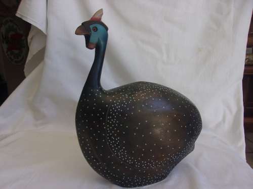 Pair of large limited edition `Feathers of Knysna` hand carved Guinea Fowl