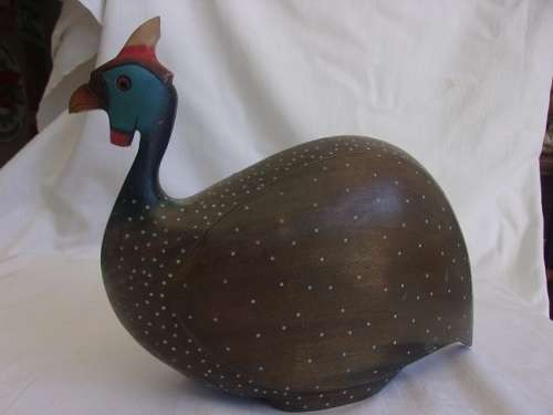 Pair of large limited edition `Feathers of Knysna` hand carved Guinea Fowl