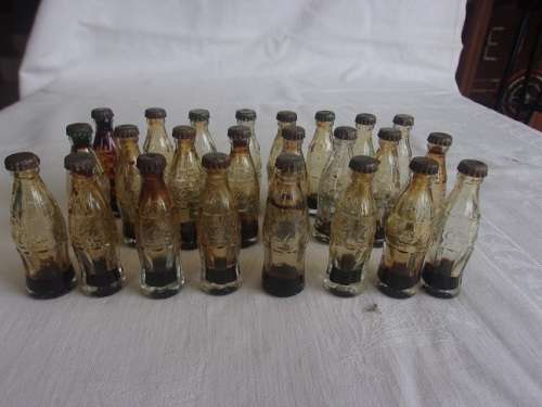 Vintage miniature yellow Coca-Cola crate with 24 glass miniature Coca-Cola bottles