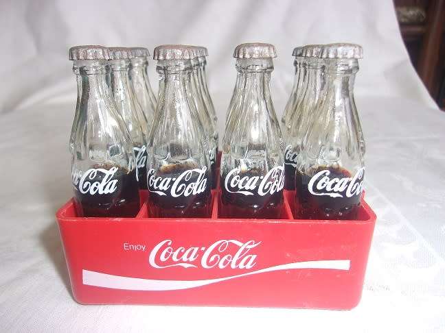 Vintage miniature red Coca-Cola crate with 12 glass miniature Coca-Cola bottles