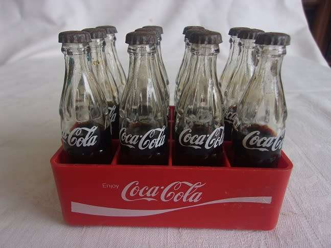 Vintage miniature red Coca-Cola crate with 12 glass miniature Coca-Cola bottles